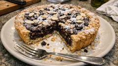 Crostata mandorle e cioccolato: frolla all’olio veloce e ripieno morbido che resta umido