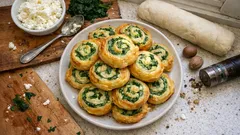 Girelle ricotta e spinaci al forno: l’antipasto veloce che fa sempre scena