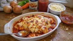 Pollo al forno pasticciato: pomodoro, besciamella e crosticina dorata