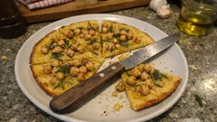 Pizza con farina di ceci: base senza glutine pronta in 15 minuti, croccante e saporita