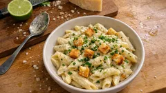 Penne cremose Grana Padano e lime: pronte in 20 minuti, con crosta croccante